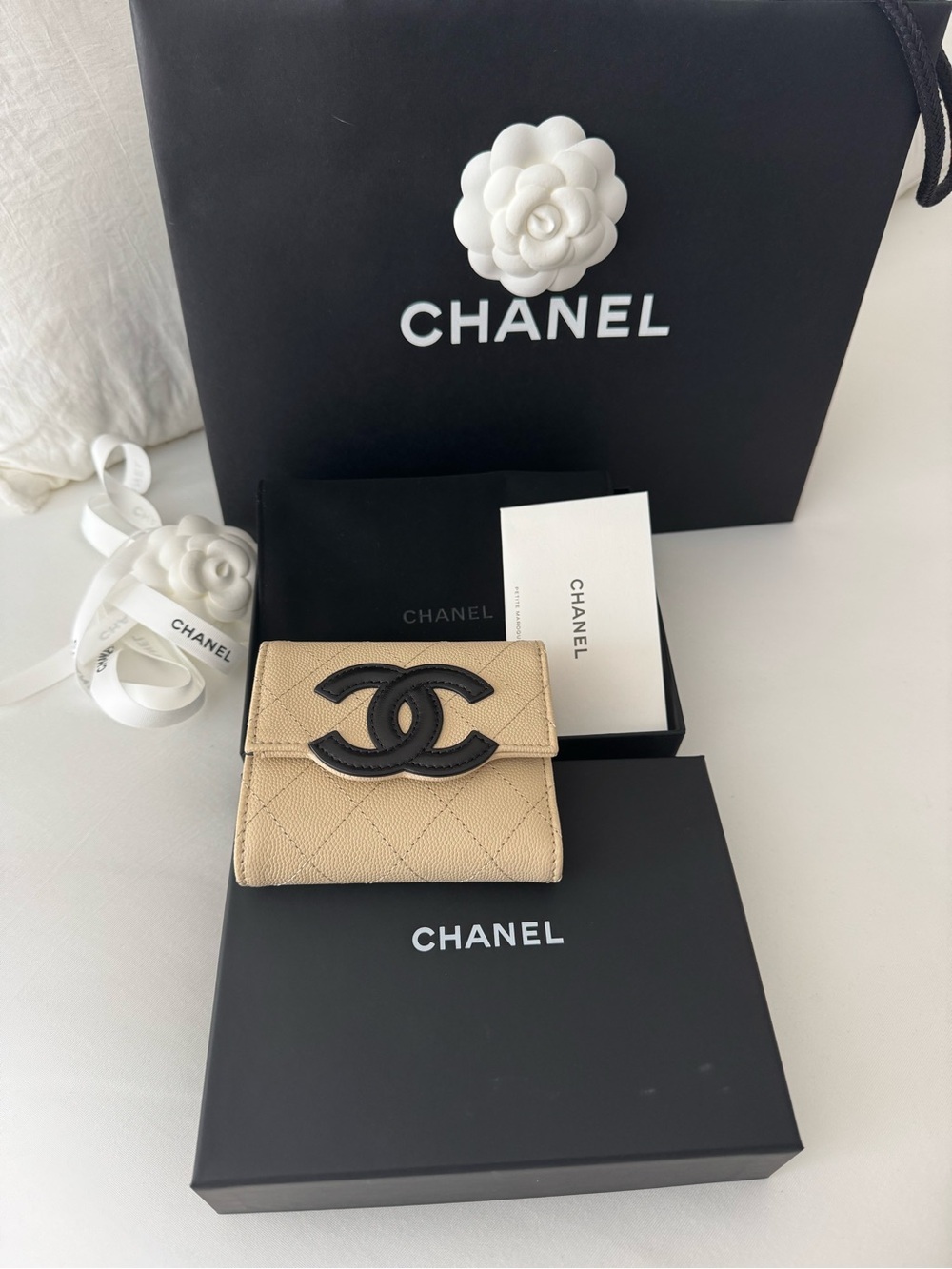 CHANEL Beige Quilted Caviar Leather Mini Wallet with Black CC Accent